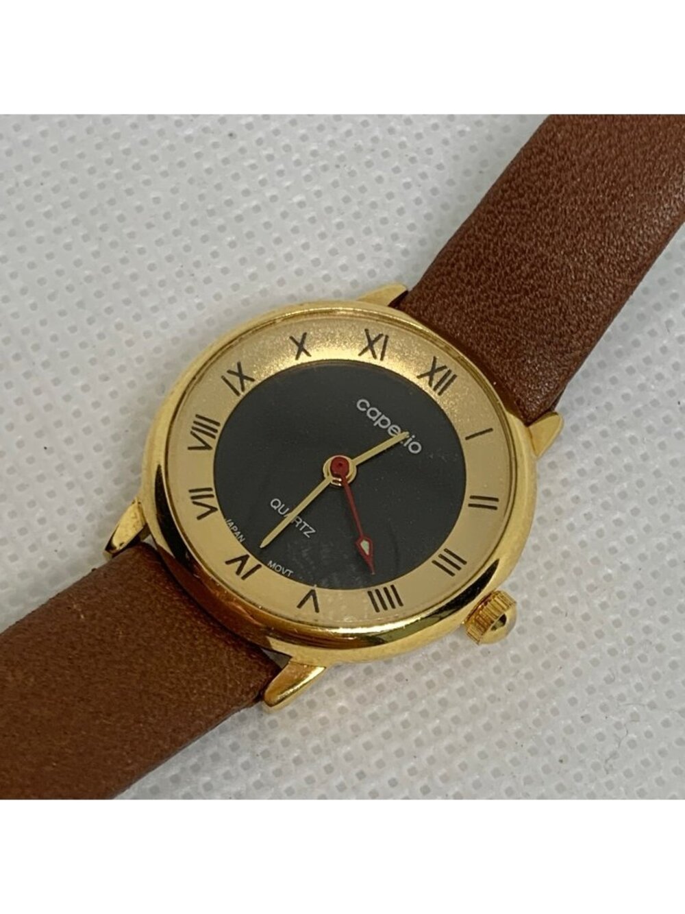 Vintage Copezio women’s gold tone watch 24mm black dial Roman indices running